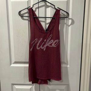 Nike workout tank. Worn once. Size medium. Fits a bit small. Excellent condition